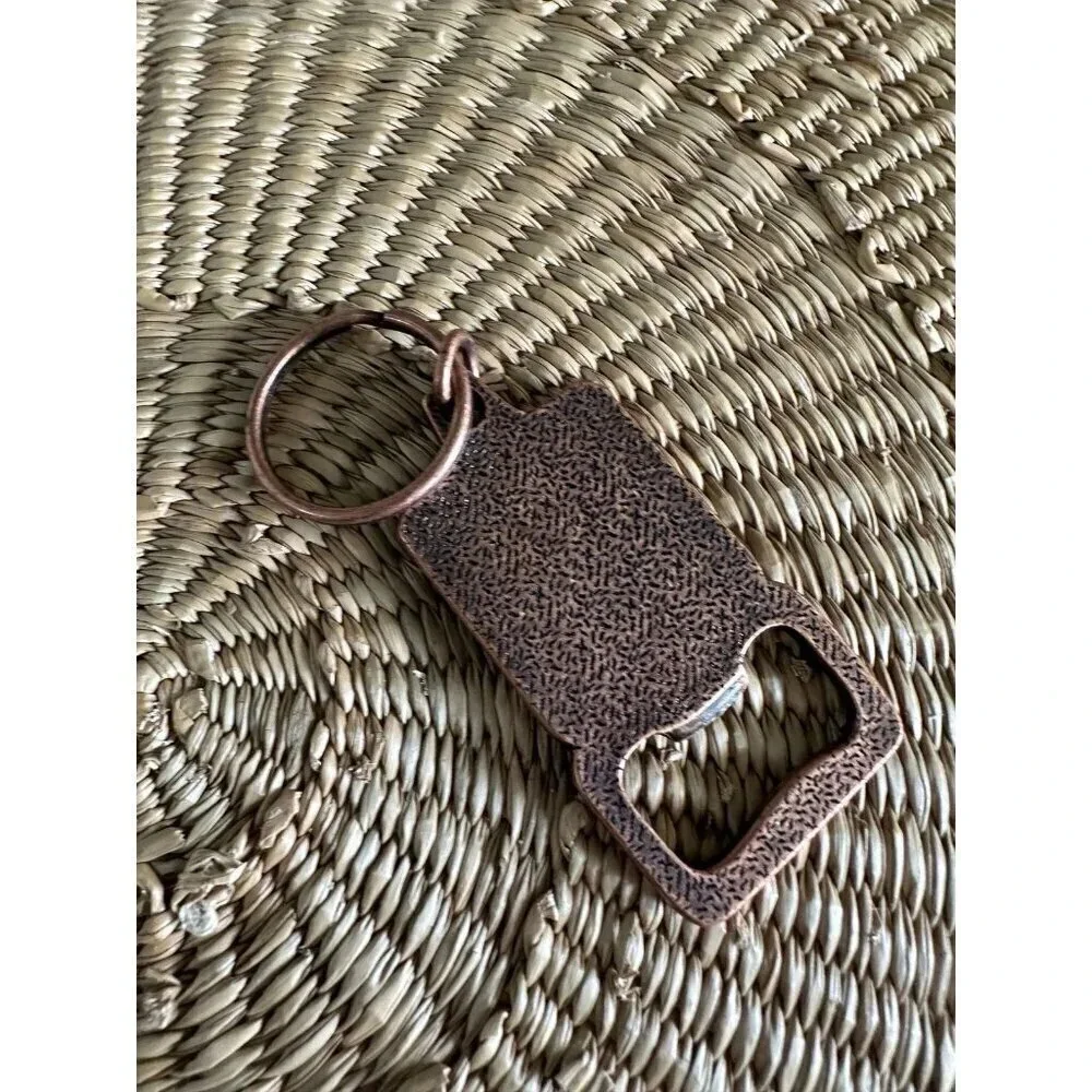 The Lodge metal bottle opener
